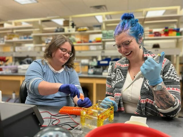 Sam and Rachel working in lab.
